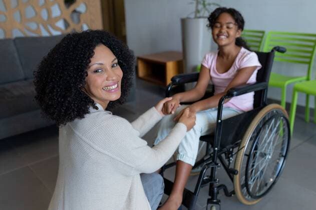Happy mixed race mother kneeling holding hands with smiling daughter in wheelchair in hospital foyer Happy mixed race mother kneeling holding hands with smiling daughter in wheelchair in hospital foyer. medicine, health and healthcare services., model released, , property released, Cape Town, South Africa, 10.04.2021, 1430662.jpg, people,happy,mixed race,mother,kneeling,holding hand,smiling,daughter,wheelchair,hospital,foyer,medicine,health healthcare,service,medical,doctor,clinic,healthcare,care,health,parent,family,patient,mom,young,treatment,cheerful,frontal,happiness,illness,together,kid,person,adult,mixed,race,holding,hand Child,Girl,Female,Mixed-Race,Young Adult,Woman