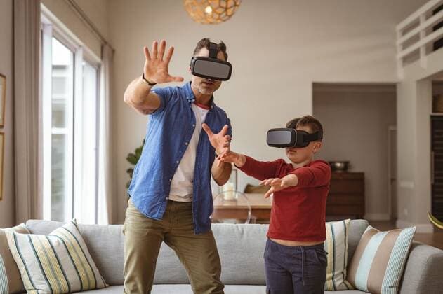 Caucasian father and son wearing vr headsets gesturing while standing in the living room at home Caucasian father and son wearing vr headsets gesturing while standing in the living room at home. gaming and entertainment concept, model released, , property released, Cape Town, South Africa, 14.09.2021, 3053471.jpg, people,caucasian,father,son,wearing,vr headset,gesturing,standing,living room,home,gaming,entertainment concept,dad,parent,mother,daughter,family,house,sofa,room,apartment,gamer,mom,together,indoors,kid,childhood,parents,frontal,interior,armchair,foyer,vr,headset,living,entertainment,concept Mature Adult,Man,Male,Caucasian,Child,Boy