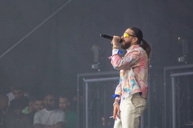 French singer SCH pictured on stage during the first day of the Les Ardentes music festival in Liege, Thursday 07 July 2022. The 15th edition of the festival is taking place from July 7 to July 10. The 2020 and 2021 editions of the festival had to be cancelled due to the Corona virus pandemic.  THOMASxMICHIELS 37120340