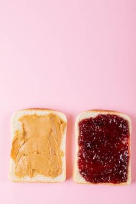 Directly above shot of open face peanut butter and jelly sandwich on pink background with copy space Directly above shot of open face peanut butter and jelly sandwich on pink background with copy space. unaltered, peanut butter and jelly sandwich, healthy food, preserves, preparation and breakfast., model released, , property released, Cape Town, South Africa, , 3117109.jpg, directly,shot,open,face,peanut butter,jelly,sandwich,pink background,copy space,unaltered,healthy food,preserve,preparation,breakfast,portrait,bread,meal,snack,drink,coffee,kitchen,delicious,food,tasty,lunch,cup,cafe,burger,cooking,beverage,gourmet,homemade,hamburger,espresso,peanut,butter,pink,background,copy,space,healthy