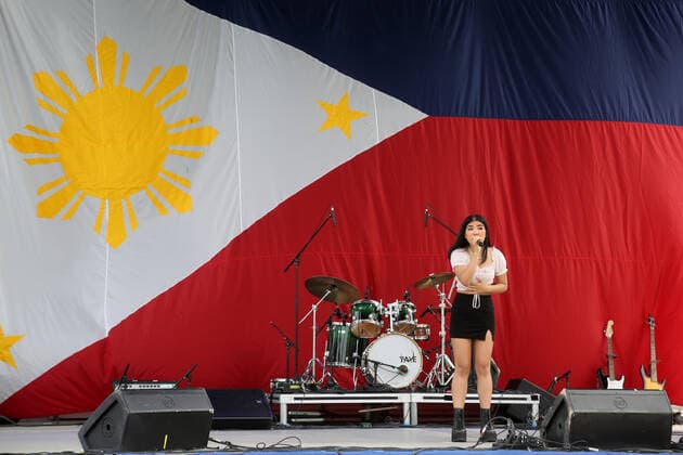 Philippine Festival In Mississauga Precious Fernandez sings a Filipino song during the Philippine Festival in Mississauga, Ontario, Canada, on July 17, 2022. Mississauga Canada  Copyright: xCreativexTouchxImagingxLtdx originalFilename: friedman-philippi220717_np5Pc.jpg