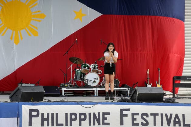 Philippine Festival In Mississauga Precious Fernandez sings a Filipino song during the Philippine Festival in Mississauga, Ontario, Canada, on July 17, 2022. Mississauga Canada  Copyright: xCreativexTouchxImagingxLtdx originalFilename: friedman-philippi220717_npDw2.jpg