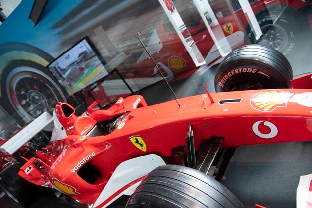 Ein Ferrari mit dem Michael Schumacher Weltmeister geworden ist, in der Ausstellung der Motorworld, Feature, Randmotiv, Verleihung des Staatspreises des Landes Nordrhein-Westfalen in Koeln am 20.07.2022