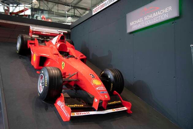 Ein Ferrari mit dem Michael Schumacher Weltmeister geworden ist, in der Ausstellung der Motorworld, Feature, Randmotiv, Verleihung des Staatspreises des Landes Nordrhein-Westfalen in Koeln am 20.07.2022