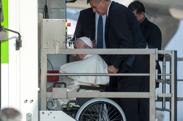 Italy, Rome, Vatican, 22 07 24. Pope Francis in a wheelchair, flanked by his butler Sandro Mariotti, is boarded on the plane that will fly him to Canada for his Apostolic Journey, at Fiumucino airport. Papa Francesco in sedia a rotelle, affiancato dal suo maggiordomo Sandro Mariotti, viene imbarcato sull aereo che lo porterÃ in Canada per il suo Viaggio Apostolico, all aeroporto di Fiumucino. Photo by Massimiliano MIGLIORATO Catholic Press Photo  Copyright: x MASSIMILIANOxMIGLIORATO CPPx x xCatholicxPressxPhotox