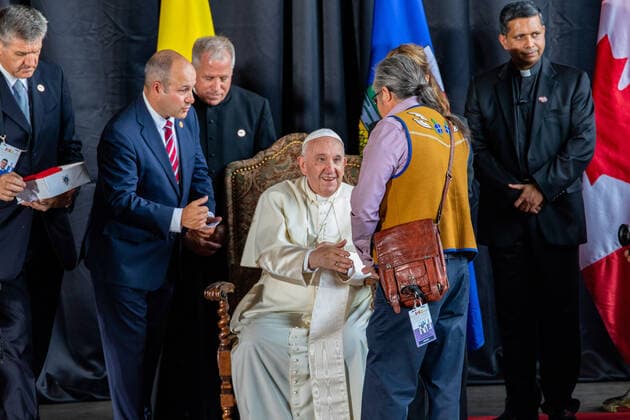 July 24, 2022, Edmonton, Alberta, Canada: Mr. Gerald Antoine (R2), Regional Chief, Assembly of First Nations greets His Holiness Pope Francis on his arrival in Canada. Edmonton Canada - ZUMAs197 20220724_zaa_s197_121 Copyright: xRonxPalmerx