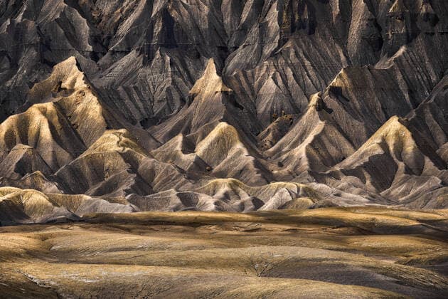Creative Highlights World From above breathtaking scenery of rocky formations in highlands in Factory Butte in Utah, USA JuanLopez_FactoryButte_22.jpg Copyright: xJuanxLopezx Model Released