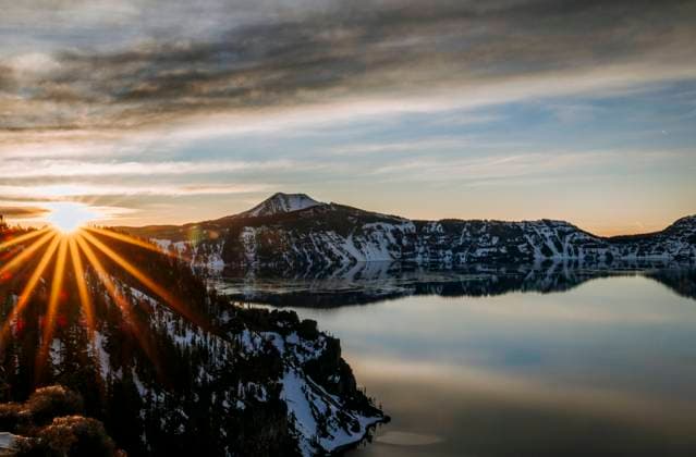 Tranquil Crater Lake National Park, Oregon in winter at sunset Medford, Oregon, United States CR_SSNF220605-929437-01