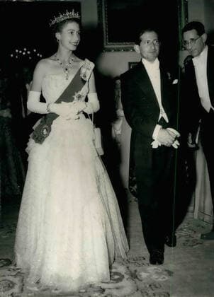 May 05, 1954 - Malta - QUEEN ELIZABETH, left, walks along a corridor with the Prime Minister of Malta, Dr. GEORG BORG OLIVER, during a reception given by the Premier in her honor at the Auberge D Aragon (House of the knights of D Aragon) the official residence of the Prime Minister. The Queen and The Duke were given a tremendous welcome by the people of the famous Island. Malta - ZUMAk09_ 19540505_baf_k09_057 Copyright: xKeystonexPressxAgencyx