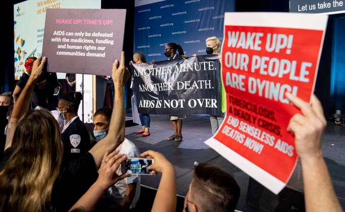 July 29, 2022, Montreal, PQ, Canada: Protesters take the stage during the opening ceremony of the AIDS 2022 conference in Montreal on Friday, July 29, 2022. Montreal Canada  - ZUMAc35_ 20220729_zaf_c35_017 Copyright: xPaulxChiassonx