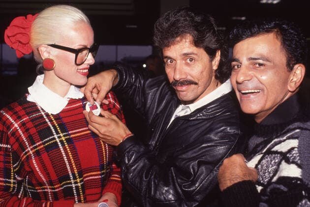 October 7, 1989, Washington, District of Columbia, USA: EDWARD JAMES OLMOS with JEAN and CASEY KASEM at Housing Now demonstration. Dozens of celebrities were part of an estimated crowd of 40,000 to 200,000 people participating in Housing Now demonstration to protest against massive cuts in federal housing funding and homelessness. President Reagan had cut the budget of the Department of Housing an Urban Development in half. Marchers carried signs like Build Houses, Not Bombs and Every Human Being Deserves a Home . Washington U.S.  - ZUMAm62_ 19891007_jtc_m62_719 Copyright: xKevinxMcKiernanx