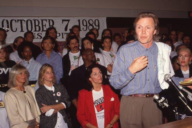 October 7, 1989, Washington, District of Columbia, USA: JON VOIGHT speaking to a group at Housing Now demonstration. Dozens of celebrities were part of an estimated crowd of 40,000 to 200,000 people participating in Housing Now demonstration to protest against massive cuts in federal housing funding and homelessness. President Reagan had cut the budget of the Department of Housing an Urban Development in half. Marchers carried signs like Build Houses, Not Bombs and Every Human Being Deserves a Home . Washington U.S.  - ZUMAm62_ 19891007_jtc_m62_726 Copyright: xKevinxMcKiernanx