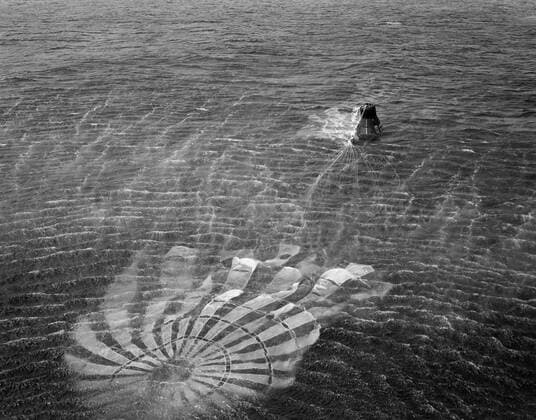 S61-01398 (18 March 1961) --- View of the recovery of the Little Joe-5A spacecraft which lifted off on March 18, 1961 from Wallops Island. The photo was taken from the recovery helicopter and shows the craft s parachute still attached and floating in the water next to the capsule. Little Joe-5A was a suborbital flight to test the Mercury capsule. The escape rocket motor fired prematurely and prior to capsule release. Copyright: xpiemagsx piemagsspace-839 !ACHTUNG AUFNAHMEDATUM GESCHÄTZT!