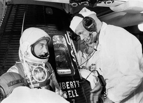 S61-02882 (1961) --- Astronaut Virgil I. (Gus) Grissom, suited up and ready to climb into Liberty Bell 7 spacecraft, talks with backup pilot John H. Glenn prior to insertion. The Mercury-Redstone 4 (MR-4) mission was scrubbed a few hours later due to unfavorable weather over the launch pad. Copyright: xpiemagsx piemagsspace-866 !ACHTUNG AUFNAHMEDATUM GESCHÄTZT!