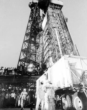 JSC2013-E-076221 (15 May 1963) --- Astronaut L. Gordon Cooper Jr. waited inside the transfer van for several minutes and then leaving the transfer van walked to the elevator which took him to the spacecraft Faith 7 atop the Atlas vehicle for his mission. (63-MA9-132) Copyright: xpiemagsx piemagsspace-1066 !ACHTUNG AUFNAHMEDATUM GESCHÄTZT!