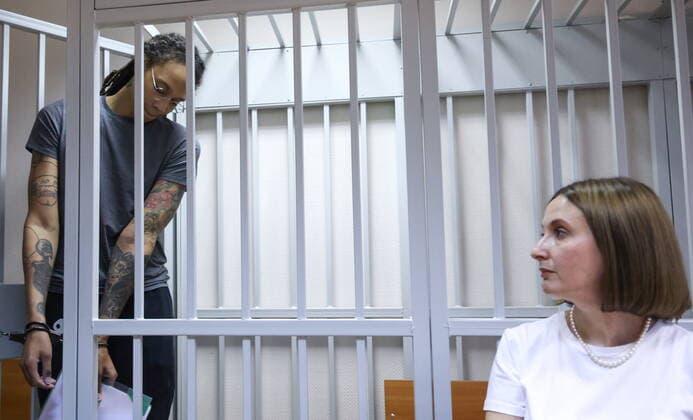 MOSCOW REGION, RUSSIA - AUGUST 4, 2022: US Olympic basketball champion Brittney Griner (L) who is on trial on drug smuggling charges, and lawyer Maria Blagovolina attend a hearing at the Khimki Municipal Court in the town of Khimki, northeast of Moscow. Griner was placed into custody till December 20 over an alleged attempt to smuggle cannabis oil into Russia through Sheremetyevo Airport. Anton Novoderezhkin TASS  TS13CEE5
