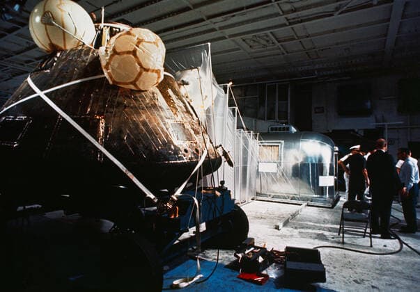 S69-40758 (24 July 1969) --- The Apollo 11 spacecraft Command Module (CM) and the Mobile Quarantine Facility (MQF) are photographed aboard the USS Hornet, prime recovery ship for the historic first lunar landing mission. The three crewmen are already in the MQF. Apollo 11 with astronauts Neil A. Armstrong, Michael Collins and Edwin E. Aldrin Jr. aboard splashed down at 11 49 a.m. (CDT), July 24, 1969, about 812 nautical miles southwest of Hawaii and only 12 nautical miles from the USS Hornet. While astronauts Armstrong, commander, and Aldrin, lunar module pilot, descended in the Lunar Module (LM) Eagle to explore the Sea of Tranquility region of the moon, astronaut Collins, command module pilot, remained with the Command and Service Modules Copyright: xpiemagsx piemagsspace-55707 !ACHTUNG AUFNAHMEDATUM GESCHÄTZT!