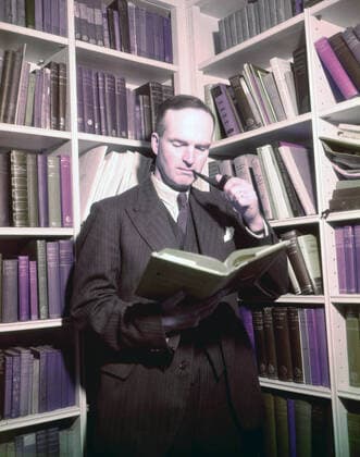 Circa 1948, London, England, United Kingdom: OLIVER SHEWELL FRANKS with book and pipe in a library. Franks was an English civil servant and philosopher who has been described as one of the founders of the postwar world . Franks was involved in Britain s recovery after the Second World War. Knighted in 1946, he was the British Ambassador to the United States of America from 1948 to 1952, during which time he strengthened the relationship between the two countries. London United Kingdom - ZUMAk09_ 19480402_zka_k09_001 Copyright: xKeystonexUSAx