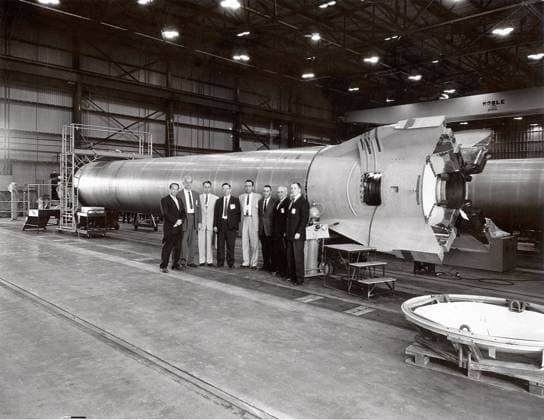 This photograph shows a group of officials standing before a Mercury-Redstone booster at the Marshall Space Flight Center (MSFC). Among those in the photograph are astronauts James Lovell, Walter Schirra, and Gus Grissom. Also pictured is Joachim Kuettner who managed responsibilities of MSFC s Mercury-Redstone program. Copyright: xpiemagsx piemagsspace-163436 !ACHTUNG AUFNAHMEDATUM GESCHÄTZT!