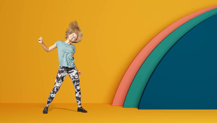Creative Highlights Symbolbilder a young girl in sport dress by dancing aerobics or fitness exercise