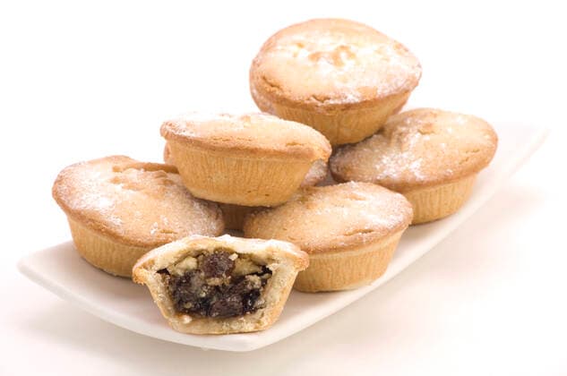 Multiple Mince Pies on a Plate isolated on a White background. Copyright: MartinxGarnham 30294068