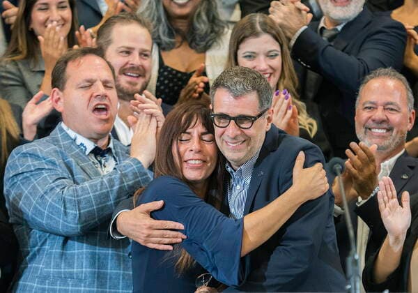 August 14, 2022, Drummondville, PQ, Canada: Quebec Conservative Party leader Eric Duhaime is embraced by Anne Casabonne, an actress and candidate for the upcoming Quebec election following his speech at the unveiling of his election campaign platform in Drummondville, Que., Sunday, August 14, 2022. Quebecers will go to the polls on October 3rd. Drummondville Canada  - ZUMAc35_ 20220814_zaf_c35_010 Copyright: xGrahamxHughesx
