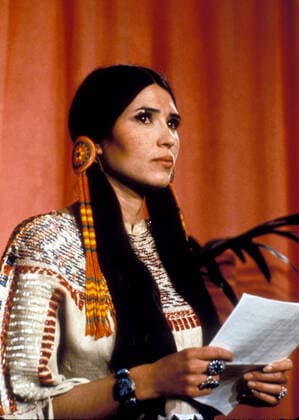 March 23, 1973, Hollywood, California, USA: Actress activist SACHEEN LITTLEFEATHER, 26, giving speech during 1973 Academy Awards. Wearing a buckskin dress and moccasins, on stage, solemnly explains that Brando very regretfully could not accept the award due to the treatment of American Indians today by the film industry. Some members of the audience clapped. Others booed. Unflustered, Littlefeather added, Brando’s rejection of the Oscar was also prompted by Native American activists’ occupation of Wounded Knee in South Dakota, which had started several weeks earlier. I beg at this time that I have not intruded upon this evening, Littlefeather concluded, and that Ö in the future, our hearts and our understandings will meet with love a  - ZUMAg49_ 20110101_gaf_g49_98581 Copyright: xGlobexPhotosx