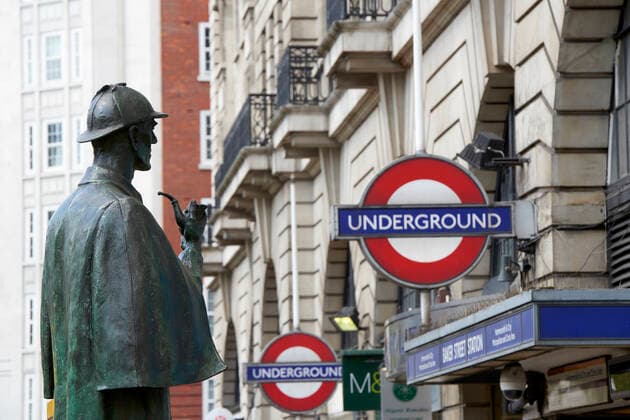 LONDON, UK - APRIL 22: Bronze statue of Sherlock Holmes in front of Baker Street station. April 22, 2015 in London. The statue was commissioned by the Sherlock Holmes Society in 1999. , 17407480.jpg, train, Baker Street, sculpture, Europe, United Kingdom, UK, England, London, underground, pipe, bronze, transport, private, investigator, city, station, English, Great Britain, Britain, British, Sherlock Holmes, metro, European, Sir, art, travel, subway, transportation, smoking, detective, statue, Arthur Conan Doyle,