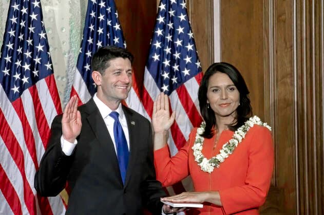 January 3, 2017, Washington DC, District of Columbia, U.S: Speaker the House Paul Ryan delivers the oath of office to Congresswoman Tulsi Gabbard (D-HI) as part of the ceremonies on opening day of the 115th session of congress Washington DC U.S. - ZUMAr142 20170103_zap_r142_043 Copyright: xMarkxReinsteinx
