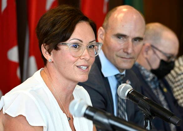 August 23, 2022, Ottawa, ON, CAN: Dr. Leigh Chapman, CanadaöÄÃ s Chief Nursing Officer, speaks as Minister of Health Jean-Yves Duclos listens, during a news conference in Ottawa, on Tuesday, Aug. 23, 2022. Ottawa CAN - ZUMAc35_ 20220823_zaf_c35_011 Copyright: xJustinxTangx