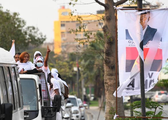(220823) -- LUANDA, Aug. 23, 2022 -- Supporters are seen on a street in Luanda, Angola, on Aug. 22, 2022. Some 14.3 million Angolan voters are expected to cast ballots to elect the country s president and members of the National Assembly Wednesday. ) TO GO WITH Angola braces for highly competitive election ANGOLA-LUANDA-ELECTION-PROMOTION ChenxCheng 