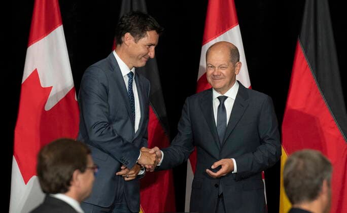 August 23, 2022, Stephenville, NFLD, Canada: Canadian Prime Minister Justin Trudeau and German Chancellor Olaf Scholz shake hands at the start of a signing ceremony on Tuesday, August 23, 2022 in Stephenville, Newfoundland and Labrador. Trudeau and Scholz signed a deal to kickstart a transatlantic hydrogen supply chain, with the first deliveries expected in just three years. Stephenville Canada  - ZUMAc35_ 20220823_zaf_c35_075 Copyright: xAdrianxWyldx