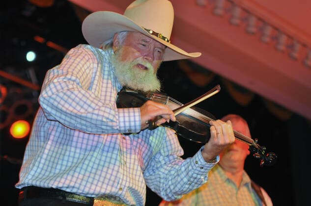Charlie Daniels, 72, plays The Devil Went Down to Georgia at the opening of the 131st National Guard Association of the United States General Conference in Nashville, Tenn., on Sept. 11, 2009. On the eighth anniversary of the terrorist attacks of 2001, Daniels gave tribute to servicemembers serving at home and overseas. Copyright: xpiemagsx milflic16082021 (37760) !ACHTUNG AUFNAHMEDATUM GESCHÄTZT!