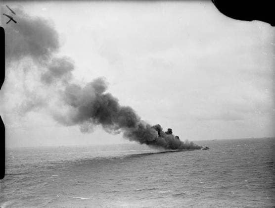 The Royal Navy during the Second World War- Operation Overlord (the Normandy Landings)- D-day 6 June 1944 View from the cruiser FROBISHER as a Landing Craft goes up in smoke after being hit by an enemy shore battery. The cruiser had helped bombard the enemy coastal positions during the week before D-Day. Copyright: xpiemagsx admiralww2pie10322-3946 !ACHTUNG AUFNAHMEDATUM GESCHÄTZT!