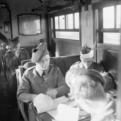 British Medical Services in the Second World War Medical Transport: Lightly wounded soldiers playing cards in a hospital train in Belgium. Trains were manned by both military and civilian crews, whose job it was to ensure safe and speedy travel to the casualties, including enemy wounded. Although disorganised and damaged by war, trains played an important part in transporting casualties from hospitals and dressing stations to bases and evacuation areas. Casualties who were able to walk were given comfortable saloon coaches for the journey. Copyright: xpiemagsx warofficeww2pie5222-522 !ACHTUNG AUFNAHMEDATUM GESCHÄTZT!