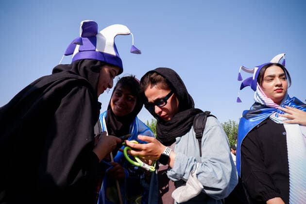 August 25, 2022, Tehran, Tehran, Iran: Female soccer fans prepare to attend a match between their team Esteghlal and Mes-e Kerman in Iran s Premier League at Azadi stadium in Tehran, Iran, Aug. 25, 2022. A limited number of Iranian women have been allowed into a stadium in Tehran to watch a league football match for the first time. Tehran Iran - ZUMAi98_ 20220825_zih_i98_044 Copyright: xRouzbehxFouladix