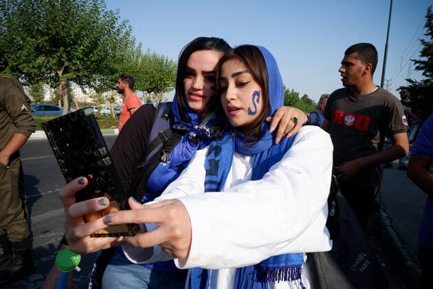 August 25, 2022, Tehran, Tehran, Iran: Female soccer fans prepare to attend a match between their team Esteghlal and Mes-e Kerman in Iran s Premier League at Azadi stadium in Tehran, Iran, Aug. 25, 2022. A limited number of Iranian women have been allowed into a stadium in Tehran to watch a league football match for the first time. Tehran Iran - ZUMAi98_ 20220825_zih_i98_059 Copyright: xRouzbehxFouladix