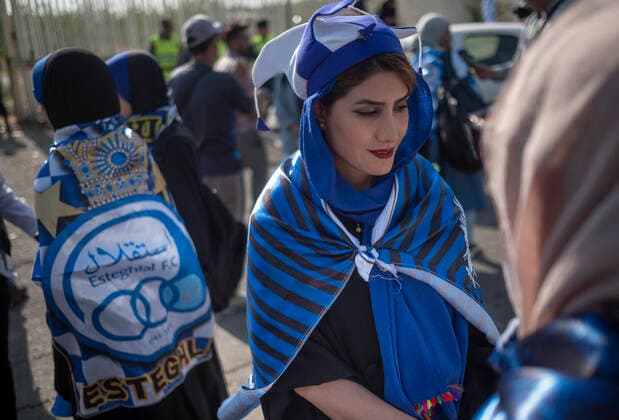 Iranian Women Allowed To Watch Football Match After FIFA Pressure An Iranian soccer female fan wearing a hat and a flag while waiting to enter the Azadi (Freedom) stadium in western Tehran for watching a soccer match between Esteghlal F.C. and Mes Kerman, August 25, 2022. For the first time after the victory of the Iranian Islamic Revolution, 500 female football fans were allowed to enter the Azadi Stadium to watch the matches of the Iranian Premier League. Tehran Iran  Copyright: xMortezaxNikoubazlx originalFilename: nikoubazl-iransocc220825_npg9f.jpg