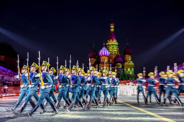 MOSCOW, RUSSIA - AUGUST 26, 2022: Russian Presidential Regiment honour guards perform during an evening show as part of the opening of the Spasskaya Tower 2022 International Military Music Festival in Red Square. Sergei Bobylev TASS  TS13F7AF