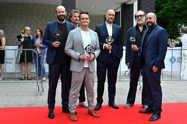 Stefan Holtz, Jan Ruschke, Florian Iwersen, Nils Landmark, Nicholas Ofczarek und Christopher Schier bei der 58. Verleihung des Grimme Preises 2022 im Theater der Stadt Marl. Marl, 26.08.2022