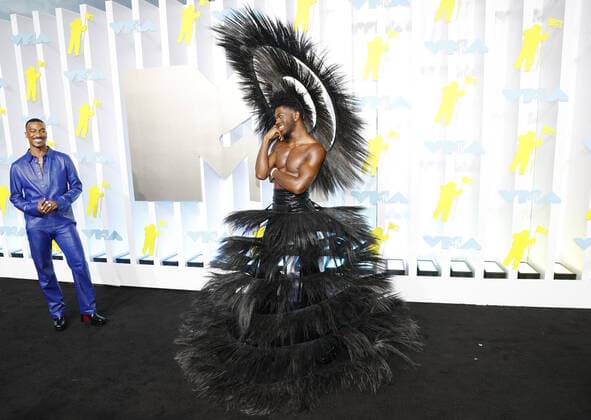 Lil Nas X, center and arrives on the red carpet at the 2022 MTV Video Music Awards VMA s at the Prudential Center in Newark, New Jersey on Sunday, August 28, 2022.  NYP20220828201 JOHNxANGELILLO