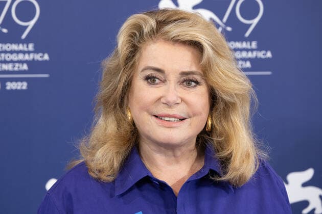 French actress Catherine Deneuve, wearing a flag of Ukraine on her shirt, poses on August 31, 2022, during a photocall for the Golden Lion for Lifetime Achievement she is to be awarded, on the opening day of the 79th Venice International Film Festival at Venice Lido. Ã‚ Photo: Cinzia Camela.  Copyright: xCinziaxCamelax xipa-agency.netx xLivexMediax
