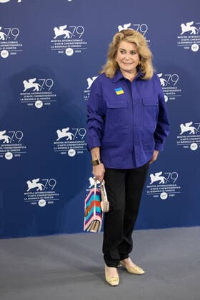 French actress Catherine Deneuve, wearing a flag of Ukraine on her shirt, poses on August 31, 2022, during a photocall for the Golden Lion for Lifetime Achievement she is to be awarded, on the opening day of the 79th Venice International Film Festival at Venice Lido. Ã‚ Photo: Cinzia Camela.  Copyright: xCinziaxCamelax xipa-agency.netx xLivexMediax