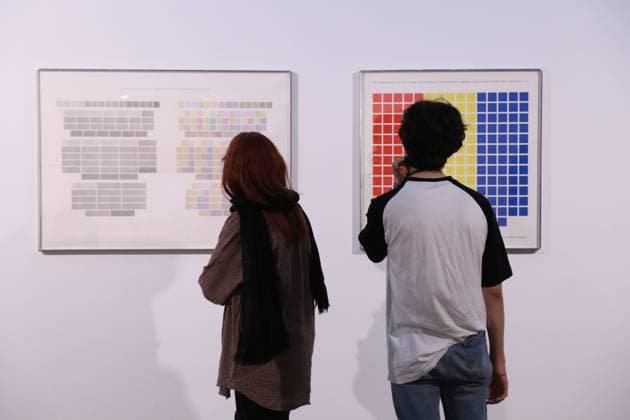 August 30, 2022, Tehran, Tehran, Iran: Iranian visitors look at Sinjerli Variations I-V, by American painter Frank Stella in 1977, during the Minimalism and Conceptual Art exhibition, which showcases works from the 19th and 20th centuries by American and European artists, at the Tehran Museum of Contemporary Art in the Iranian capital on August 30, 2022. More than 20,000 people have flocked to an Iranian museum showcasing dozens of renowned Western artists works, some for the first time -- part of a treasure trove amassed before the Islamic Revolution. The museum s collection is reputed to be the greatest line-up of modern masterpieces outside Europe and the United States and includes multi-million-dollar pieces, much of which have bee - ZUMAi98_ 20220830_zih_i98_071 Copyright: xRouzbehxFouladix