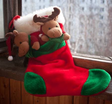 Red christmas sock for presents on the window , 4505742.jpg, sock, stocking, christmas, christmasday, bear, celebrate, celebration, decorations, eve, filler, gifts, holiday, inside, morning, present, red, socks, stockings, stuffer, toy, tradition, traditional, winter, xmas,