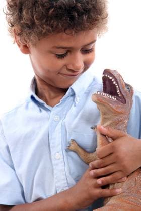 Little boy playing with a dinosaur, model released, , 5615706.jpg, _ M_Casteres_Ruffinel_Lenny_300710, 3-4, 5-6, African, afro, American, boy, child, cute, dinosaur, education, elementary, game, happy, holding, indoor, isolated, kid, kindergarten, kindergartner, knowledge, learn, lesson, looking, male, people, person, play, portrait, positive, preschool, pupil, school, schoolboy, schooling, smile, stand, student, studio, study, symbol, time, toy, write, years, young, youth,