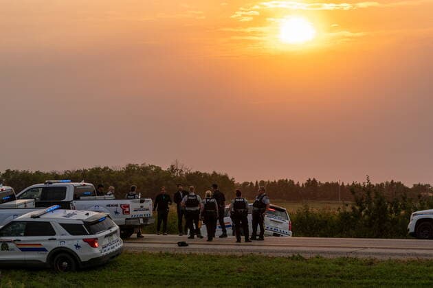 September 7, 2022, Rosthern, SK, Canada: Police and investigators are seen on a road outside Rosthern, Sask., on Wednesday, Sept. 7, 2022. RCMP say Myles Sanderson, a suspect in a deadly stabbing rampage northeast of Saskatoon over the weekend, has been taken into custody near the town of Rosthern on the fourth day of a massive manhunt. Rosthern Canada - ZUMAc35_ 20220907_zaf_c35_147 Copyright: xHeywoodxYux
