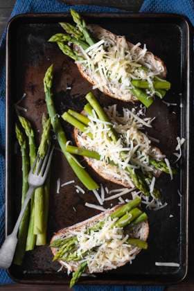 Preparation of cheese and asparagus on sourdough bread. Copyright: xVickixValex VV181020-4