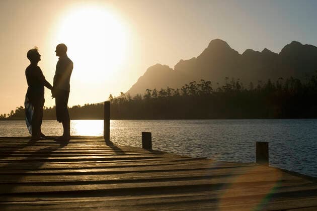 Senior Couple Standing On Edge Of Pier, model released, , property released, , 10007702.jpg, Adult, Baby Boomer, Cape Town, Caucasian, Countryside, Couple, Dock, Edge, Enjoying, Female, Happy, Holding Hands, Horizontal, Idyllic, Jetty, Lake, Leisure, Lensflare, Lourensford, Love, Male, Man, Men, Middle Age, Mountain, Nature, Outdoors, People, Person, Pier, Recreation, Relaxation, Retirement, Rural, Scenic, Side View, Silhouette, South Africa, Standing, Summer, Sunlight, Sunset, Togetherness, Two, Vacation, Water, Weekend, Woman, Women, 50s,