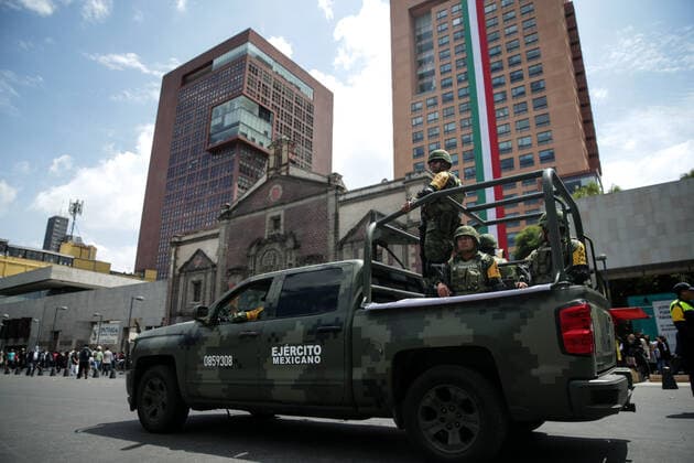 (220919) -- MEXICO CITY, Sept. 19, 2022 -- Soldiers patrol after an earthquake in central Mexico City, Mexico, on Sept. 19, 2022. An earthquake with a magnitude of 7.4 shook Mexico on Monday, according to preliminary data, with further details unavailable at the moment. ) MEXICO-MEXICO CITY-EARTHQUAKE FranciscoxCanedo 